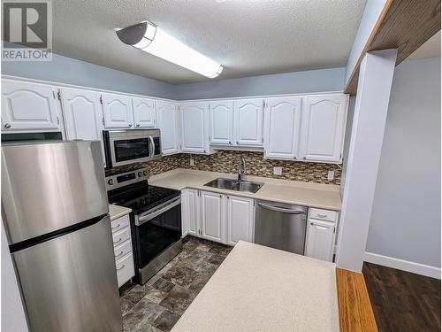 1610 Gordon Drive Unit# 206, Kelowna, BC - Indoor Photo Showing Kitchen With Stainless Steel Kitchen With Double Sink