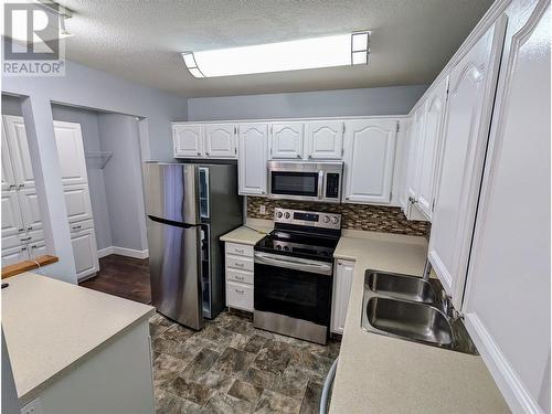 1610 Gordon Drive Unit# 206, Kelowna, BC - Indoor Photo Showing Kitchen With Stainless Steel Kitchen With Double Sink