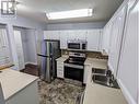 1610 Gordon Drive Unit# 206, Kelowna, BC  - Indoor Photo Showing Kitchen With Stainless Steel Kitchen With Double Sink 