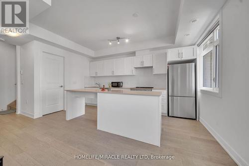 230 - 1062 Douglas Mccurdy Common N, Mississauga, ON - Indoor Photo Showing Kitchen