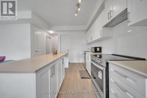 230 - 1062 Douglas Mccurdy Common N, Mississauga, ON - Indoor Photo Showing Kitchen