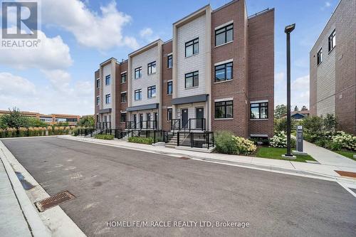 230 - 1062 Douglas Mccurdy Common N, Mississauga, ON - Outdoor With Facade