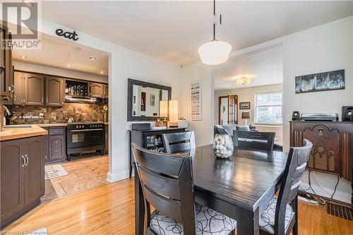 Dining area with light hardwood / wood-style floors and sink - 48 Dane Street, Kitchener, ON - Indoor