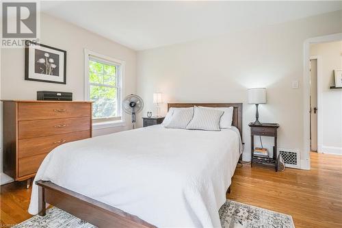 Bedroom featuring hardwood / wood-style flooring - 48 Dane Street, Kitchener, ON - Indoor Photo Showing Bedroom