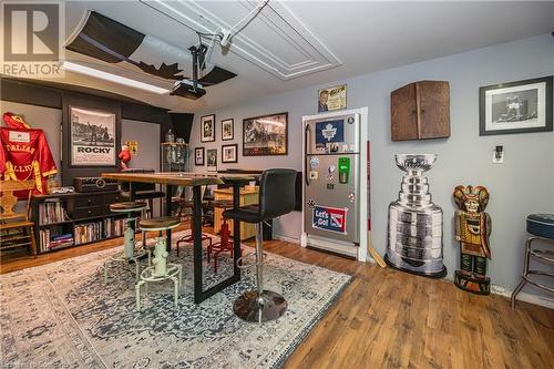 Game room with hardwood / wood-style floors - 48 Dane Street, Kitchener, ON - Indoor