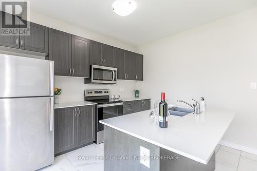 7 Sandhill Crane Drive, Wasaga Beach, ON - Indoor Photo Showing Kitchen With Stainless Steel Kitchen With Double Sink