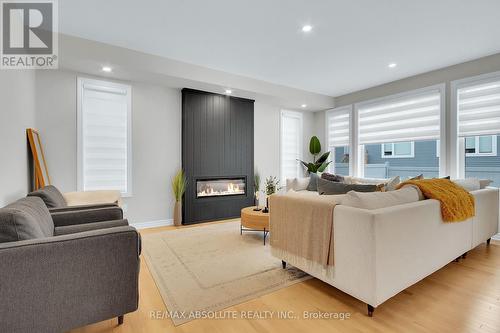 12 Jargeau Road, Ottawa, ON - Indoor Photo Showing Living Room With Fireplace