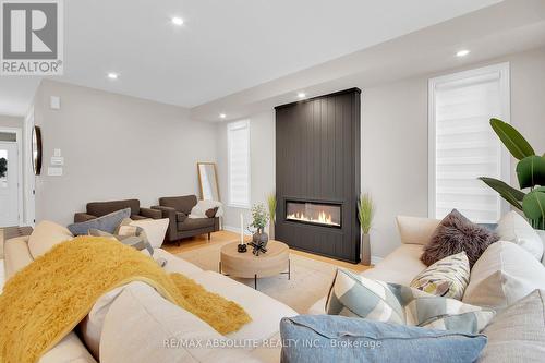 12 Jargeau Road, Ottawa, ON - Indoor Photo Showing Living Room With Fireplace