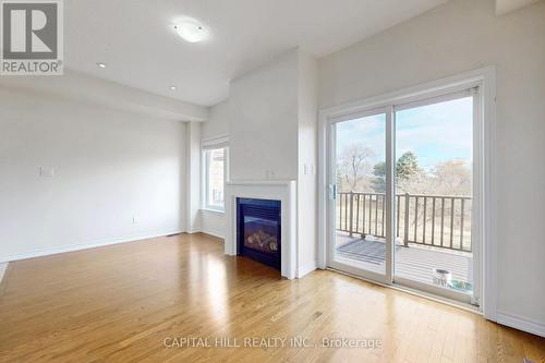 7 Pidgeon Street, Toronto, ON - Indoor Photo Showing Other Room With Fireplace