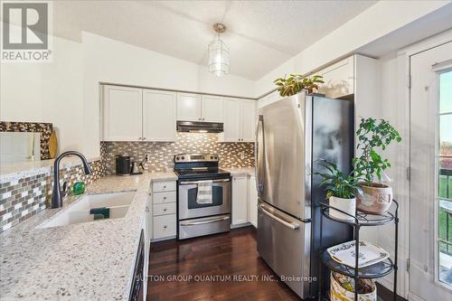 411 - 1370 Main Street E, Milton, ON - Indoor Photo Showing Kitchen With Upgraded Kitchen