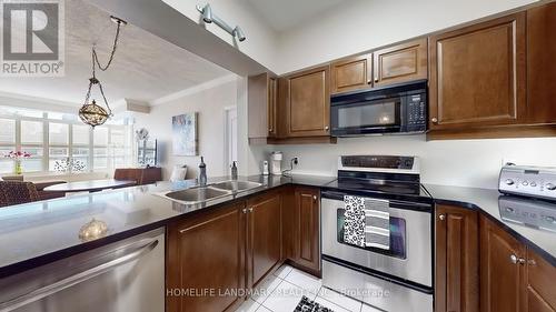 309 - 2 Edith Drive, Toronto, ON - Indoor Photo Showing Kitchen With Double Sink