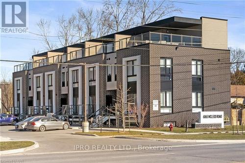 214 - 6065 Mcleod Road, Niagara Falls, ON - Outdoor With Facade