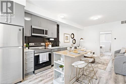 214 - 6065 Mcleod Road, Niagara Falls, ON - Indoor Photo Showing Kitchen