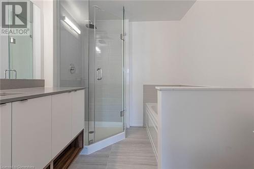 Bathroom with tile patterned floors, vanity, and separate shower and tub - 1121 Cooke Boulevard Unit# 7, Burlington, ON - Indoor Photo Showing Bathroom