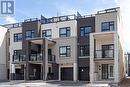 View of property featuring a garage - 1121 Cooke Boulevard Unit# 7, Burlington, ON  - Outdoor With Balcony With Facade 