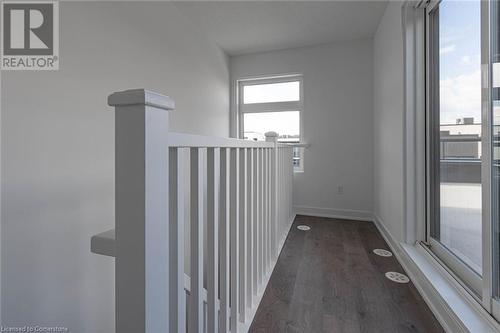 Hallway with dark hardwood / wood-style floors - 1121 Cooke Boulevard Unit# 7, Burlington, ON - Indoor Photo Showing Other Room