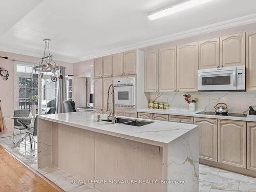 102 Pennyroyal Cres, Brampton, ON - Indoor Photo Showing Kitchen With Double Sink