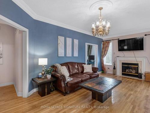 102 Pennyroyal Cres, Brampton, ON - Indoor Photo Showing Living Room With Fireplace