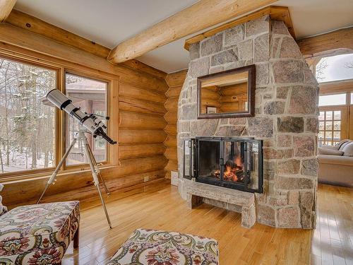 Salon - 105 Ch. Des Ancêtres, Mont-Tremblant, QC - Indoor Photo Showing Living Room With Fireplace