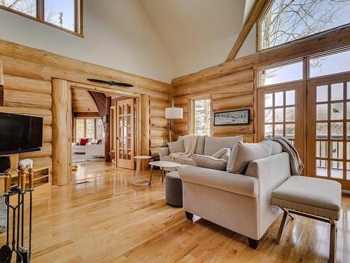 Salon - 105 Ch. Des Ancêtres, Mont-Tremblant, QC - Indoor Photo Showing Living Room With Fireplace