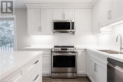 204 - 100 Gordon Street, Stratford, ON - Indoor Photo Showing Kitchen With Double Sink