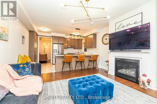 7 Dalbeattie Drive, Brampton, ON - Indoor Photo Showing Living Room With Fireplace