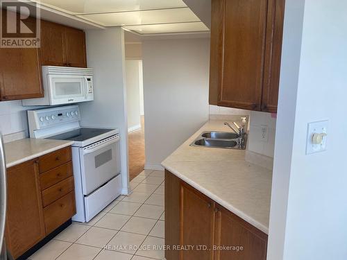 607 - 360 Watson Street, Whitby (Port Whitby), ON - Indoor Photo Showing Kitchen With Double Sink