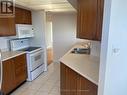 607 - 360 Watson Street, Whitby (Port Whitby), ON  - Indoor Photo Showing Kitchen With Double Sink 