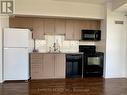 2205 - 30 Herons Hill Way, Toronto, ON  - Indoor Photo Showing Kitchen 