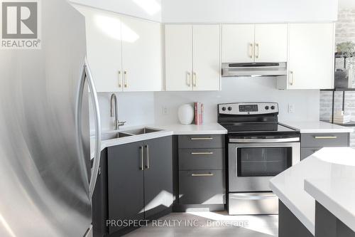 301 - 200 Manitoba Street, Toronto, ON - Indoor Photo Showing Kitchen With Double Sink With Upgraded Kitchen