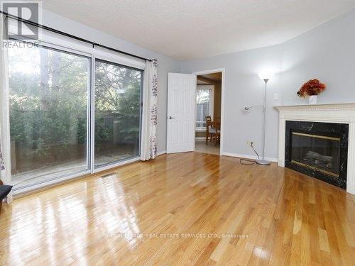 19 - 3420 South Millway, Mississauga, ON - Indoor Photo Showing Living Room With Fireplace