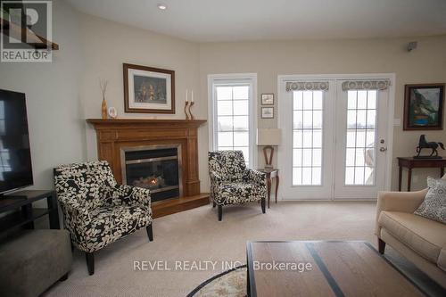 15 Burton Avenue, Brant, ON - Indoor Photo Showing Living Room With Fireplace