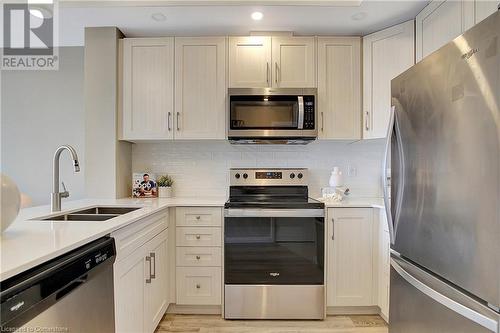 60 Charles Street Unit# 2403, Kitchener, ON - Indoor Photo Showing Kitchen With Stainless Steel Kitchen With Double Sink With Upgraded Kitchen