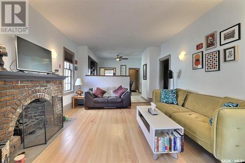 3438 Victoria Avenue, Regina, SK - Indoor Photo Showing Living Room With Fireplace