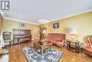 6360 Wyandotte Street East, Windsor, ON  - Indoor Photo Showing Living Room 