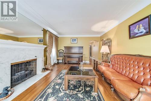 6360 Wyandotte Street East, Windsor, ON - Indoor Photo Showing Living Room With Fireplace