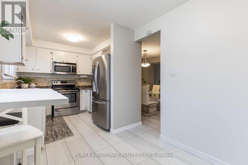 100 - 11 Harrisford Street, Hamilton, ON - Indoor Photo Showing Kitchen With Stainless Steel Kitchen