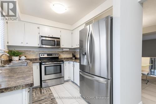 100 - 11 Harrisford Street, Hamilton, ON - Indoor Photo Showing Kitchen With Stainless Steel Kitchen With Double Sink