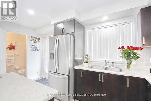 125 - 1 Beckenrose Court, Brampton, ON - Indoor Photo Showing Kitchen With Double Sink