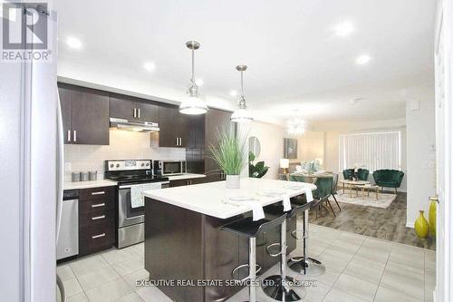 125 - 1 Beckenrose Court, Brampton, ON - Indoor Photo Showing Kitchen With Upgraded Kitchen