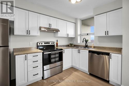 1004 - 81 Scott Street, St. Catharines (443 - Lakeport), ON - Indoor Photo Showing Kitchen With Double Sink