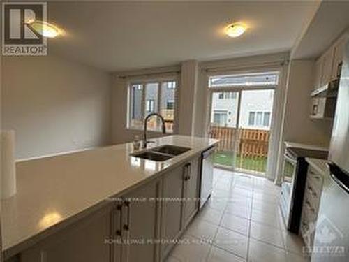 250 Tullaghan Heights, Ottawa, ON - Indoor Photo Showing Kitchen With Double Sink