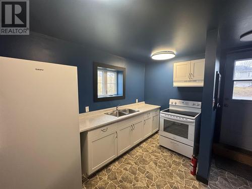 61 Chaytors Road, Conception Bay South, NL - Indoor Photo Showing Kitchen With Double Sink