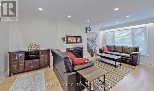 7 Foxwarren Drive, Toronto, ON - Indoor Photo Showing Living Room With Fireplace