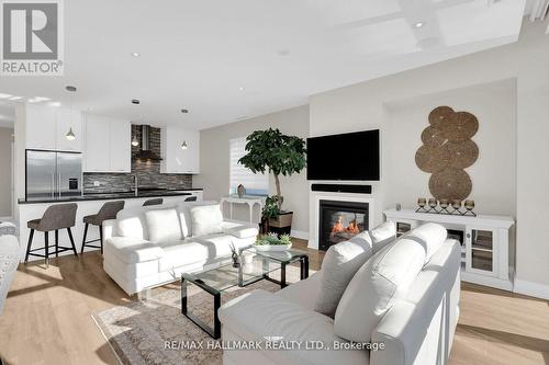 3740 Mangusta Court, Innisfil, ON - Indoor Photo Showing Living Room With Fireplace