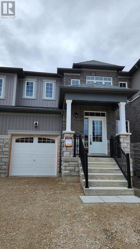 18 Stately Drive, Wasaga Beach, ON - Outdoor With Facade