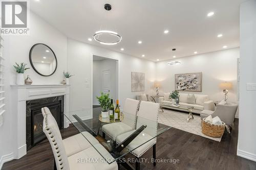 3067 Max Khan Boulevard, Oakville, ON - Indoor Photo Showing Dining Room With Fireplace