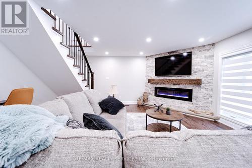 885 Glen Cedar Drive, Smith-Ennismore-Lakefield, ON - Indoor Photo Showing Living Room With Fireplace