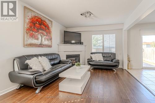 35 Lookout Street, Essa, ON - Indoor Photo Showing Living Room With Fireplace