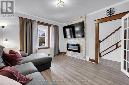 53 1/2 Robins Avenue, Hamilton, ON - Indoor Photo Showing Living Room With Fireplace